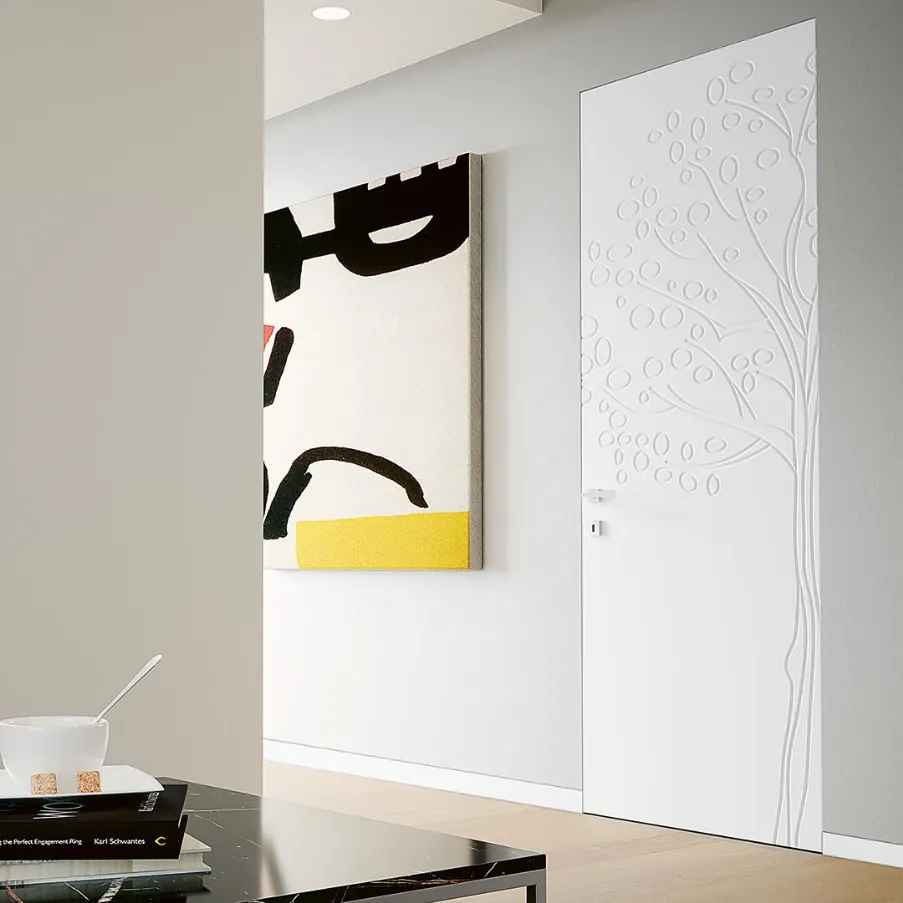 Porta interna filo muro Massima con finitura effetto cemento