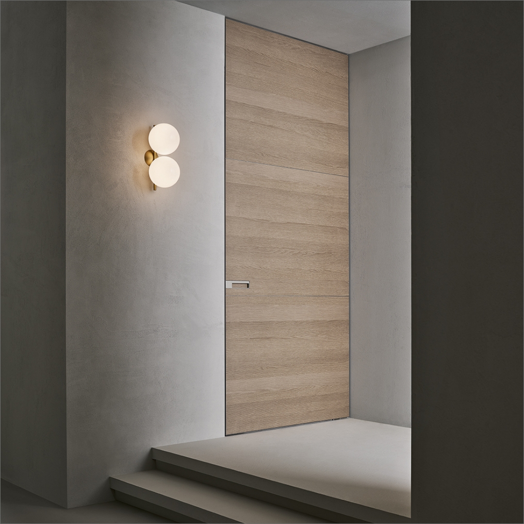 Porta Radius con finitura in essenza sahara in ambiente elegante